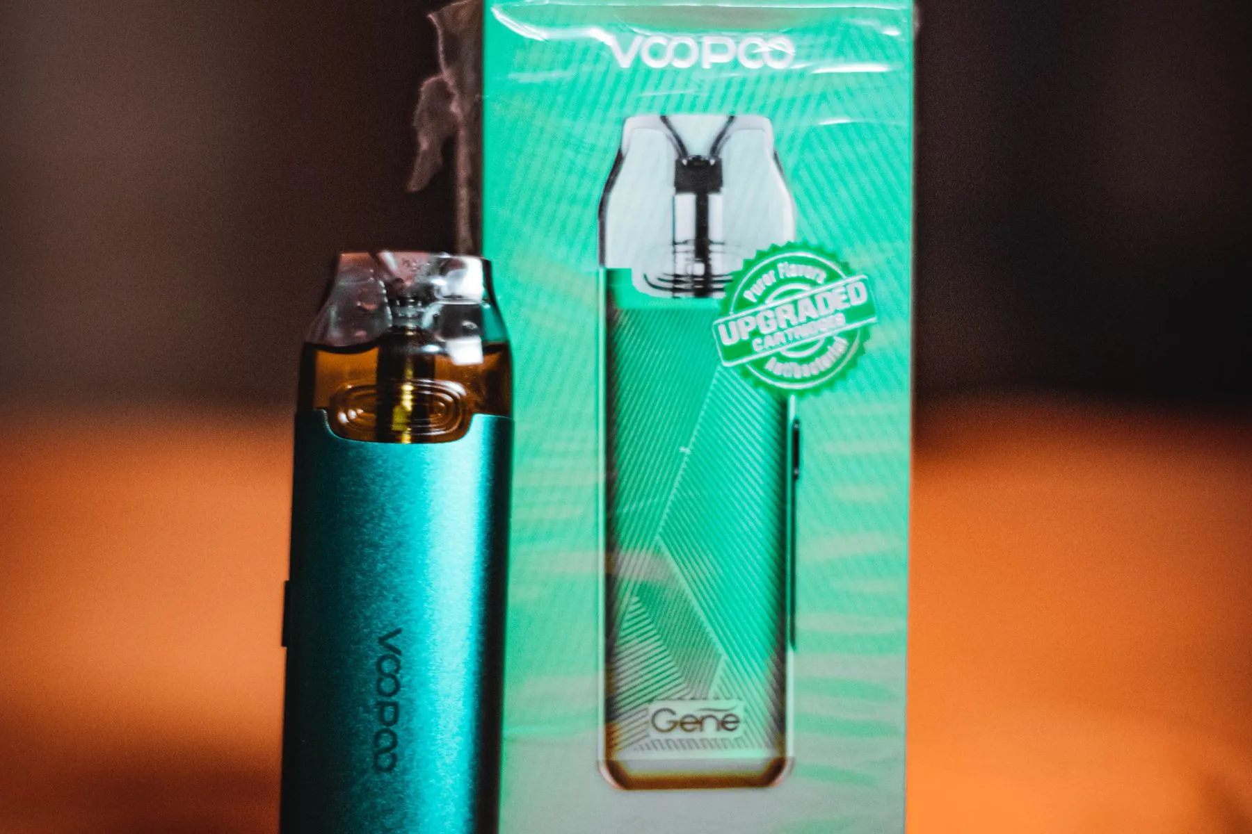 A row of vape devices and cartridges on a shelf